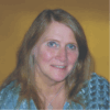 Portrait photo of contributing writer, Theresa Russell