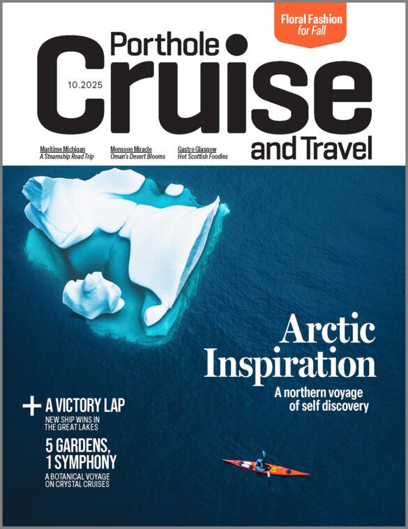 PHC259_c1-frame_1185x1535 A kayaker paddles past an iceberg on a blue-and-white Porthole magazine cover under the words "Arctic Inspiration: a northern voyage of self discovery"
