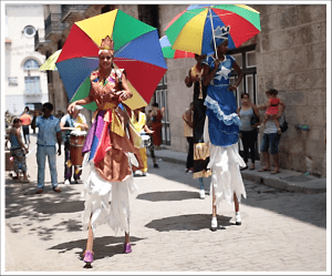 Street performers entertain visitors to Cuba