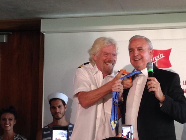 Richard Branson Attacks Tie With Scissors